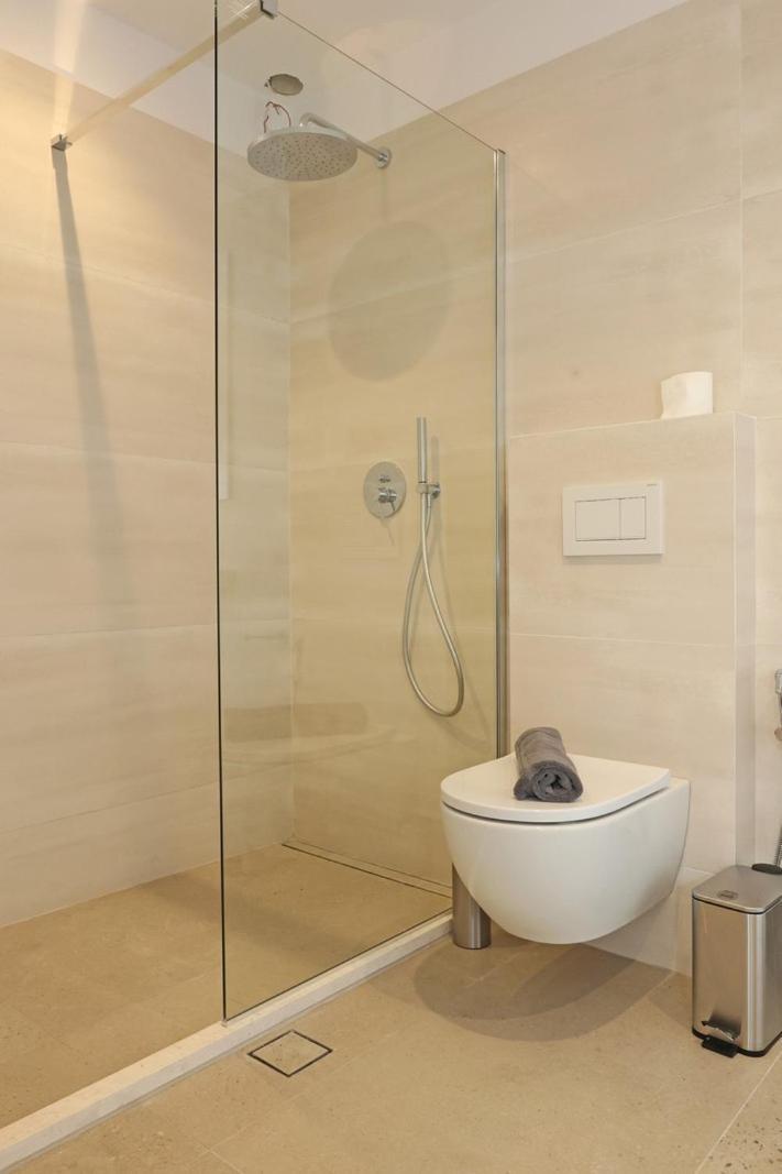 אנו סירוס Delfini Suites מראה חיצוני תמונה