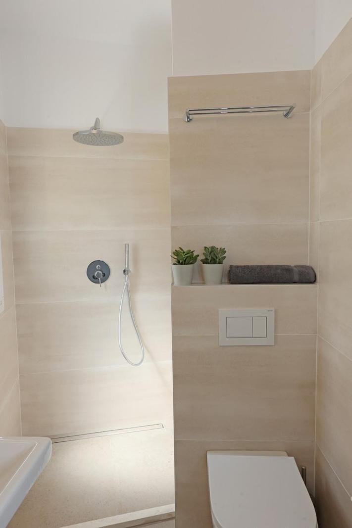 אנו סירוס Delfini Suites מראה חיצוני תמונה